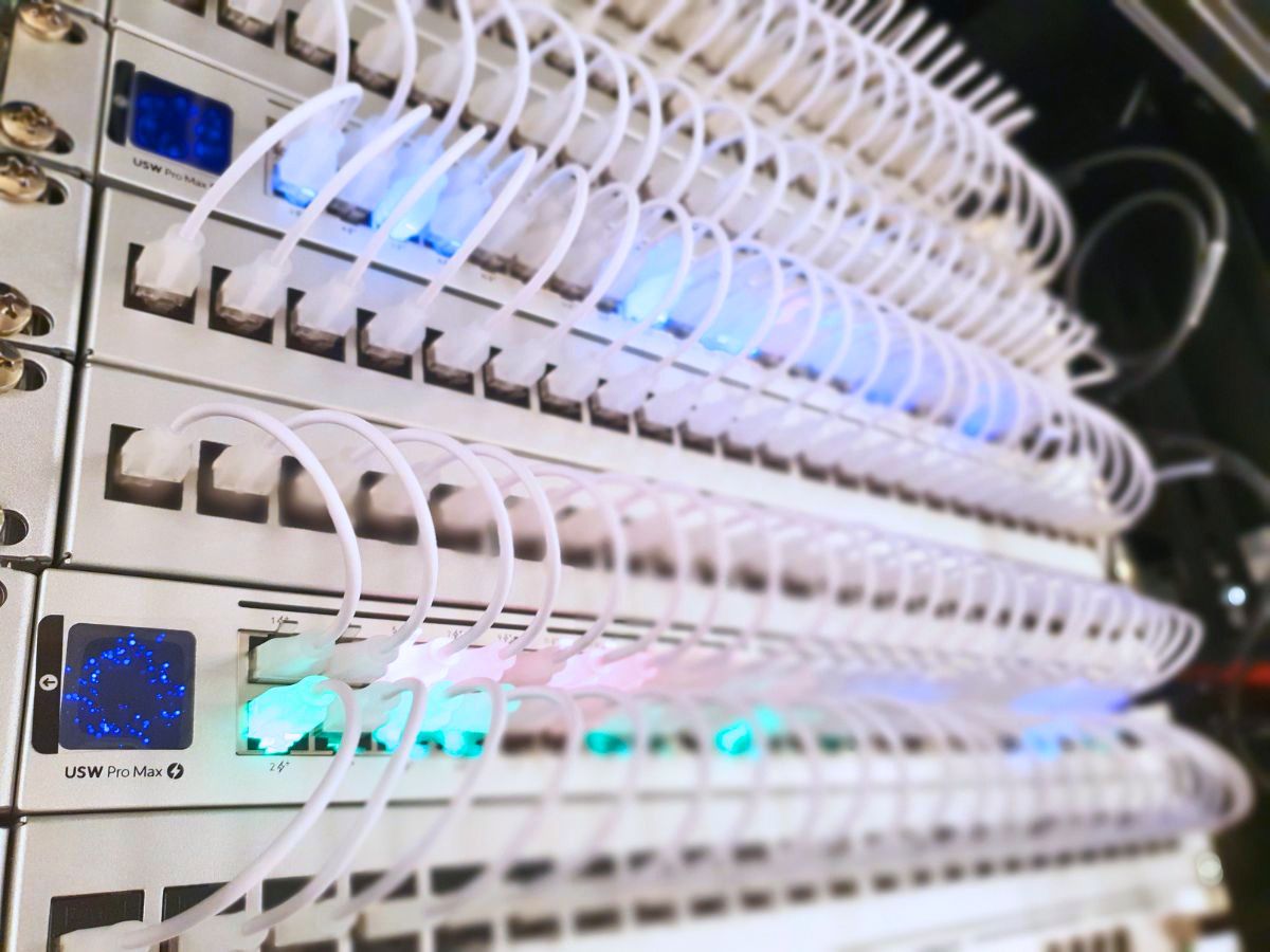 Close-up of organised network cabling and server infrastructure in a secure IT environment